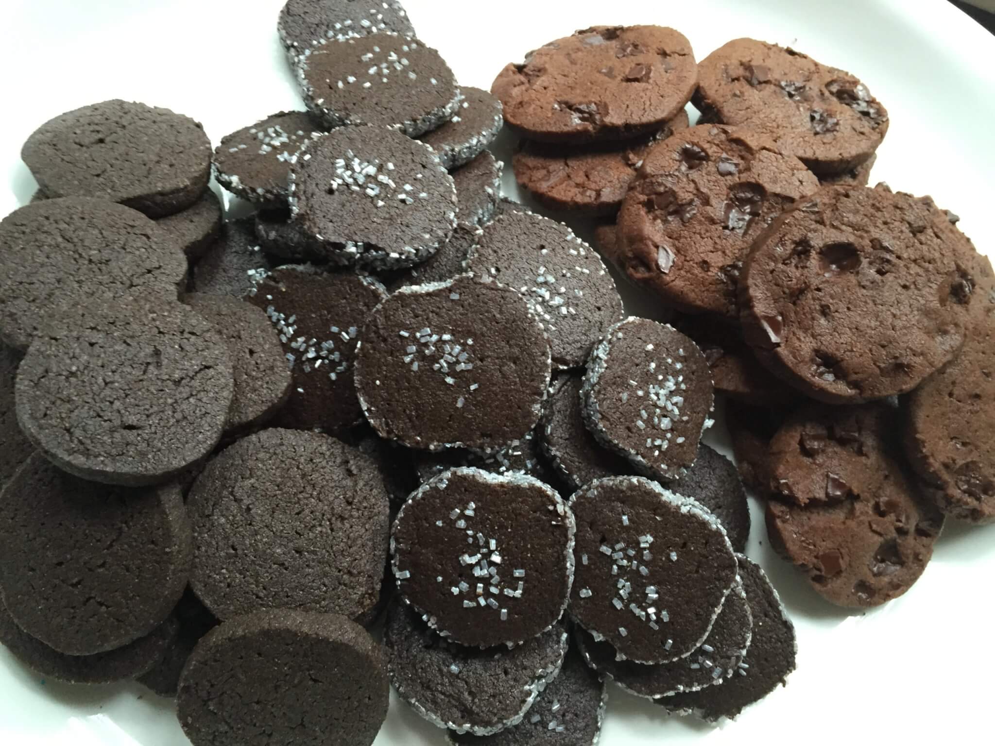 Platter of 3 different types of dark chocolate cookies, to inspire readers who want to start a new cookie business