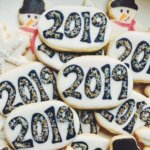 New Year's decorated cookies of snowmen and 2019 on oval cookies