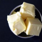 Chunks of butter in a small bowl