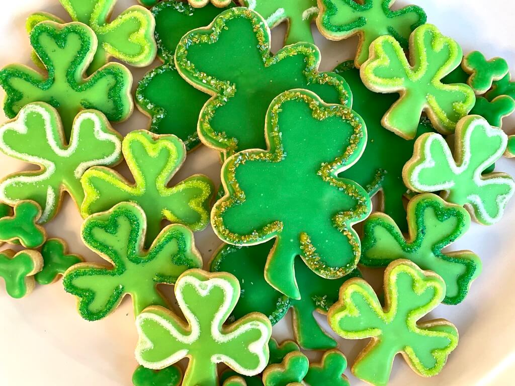 Platter of green decorated shamrock cookies