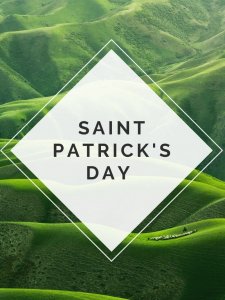 Saint Patrick's Day displayed over background of green rolling hills